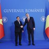 Thủ tướng Phạm Minh Chính và Thủ tướng Ion-Marcel Ciolacu. (Ảnh: VGP/Nhật Bắc)