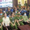 Bị cáo Trương Mỹ Lan (hàng đầu, thứ hai từ trái sang) tại phiên tòa