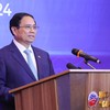 Thủ tướng Phạm Minh Chính cho rằng, cùng với chuyển đổi xanh, chuyển đổi số trở thành xu thế tất yếu, là những động lực tăng trưởng mới cho phát triển nhanh, bền vững. (Ảnh: VGP/Nhật Bắc)