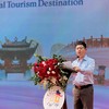 Ông Bùi Duy Quang, Phó giám đốc Trung tâm Xúc tiến Đầu tư, Thương mại, Du lịch Hà Nội phát biểu tại hội nghị. (Ảnh: Nguyễn Linh)