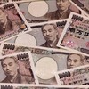 Đồng tiền mệnh giá 10.000 yen của Nhật Bản. Ảnh tư liệu: AFP/TTXVN