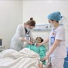 Chăm sóc bệnh nhân tại bệnh viện TNH Thái Nguyên. Ảnh Dũng Minh