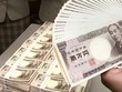 Đồng yên trượt giá 0,3% xuống mức 151,97 JPY đổi 1 USD trong giao dịch ngày 27/3 tại Tokyo. Ảnh: AFP