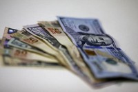 OECD: Các ngân hàng trung ương nên tiếp tục tăng lãi suất