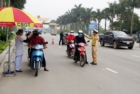 Các lực lượng phải thực hiện nghiêm, hiệu quả việc phòng chống dịch bệnh COVID-19, gắn với tuần tra kiểm soát, xử lý vi phậm trật tự an toàn giao thông vận tải. (Nguồn ảnh: Báo Bắc Ninh).