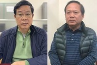 Ông Nguyễn Bắc Son (trái) và ông Trương Minh Tuấn tại cơ quan điều tra khi bị bắt vào tháng 2. Ảnh: Bộ Công an