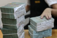 Ngân hàng chữa bệnh "thừa tiền", tín dụng vẫn tăng chậm