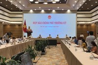 Phiên họp báo Chính phủ thường kỳ tháng 7/2021. (Ảnh: Xuân Quảng/Vietnam+).