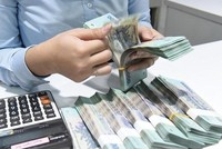 Tỷ giá bớt căng thẳng, cần tập trung cứu thanh khoản, lãi suất