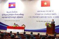 Phó Thủ tướng Chính phủ Trần Lưu Quang phát biểu tại Hội nghị.