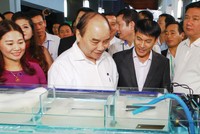 Thủ tướng Chính phủ Nguyễn Xuân Phúc thăm gian hàng Công ty Nam Miền Trung tại Hội nghị Xây dựng nền công nghiệp nông nghiệp Việt Nam (tháng 12/2016 tại TP.HCM)
