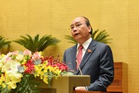 Thủ tướng Chính phủ Nguyễn Xuân Phúc báo cáo trước Quốc hội (Ảnh Duy Linh).