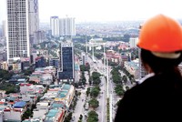 Diễn biến dịch bệnh Covid-19 có thể tác động mạnh mẽ tới đà tăng trưởng của thị trường bất động sản. Ảnh: Dũng Minh