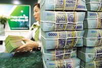 Nguồn lực cho gói hỗ trợ lãi suất đã sẵn sàng, song việc giải ngân còn chờ hướng dẫn cụ thể. Ảnh: Đức Thanh