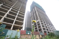 Tình trạng chủ đầu tư bàn giao nhà chậm trễ diễn ra khá phổ biến. Ảnh: Dũng Minh