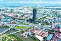 Hải Phòng đang hoàn thiện quy hoạch, thu hút dòng vốn phục vụ nhu cầu phát triển. Trong ảnh: Đô thị cửa ngõ phía Tây Hải Phòng. Ảnh: Hồng Phong