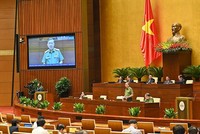 Bộ trưởng Bộ Công an Tô Lâm trả lời chất vấn tại phiên họp thứ 14 của Ủy ban Thường vụ Quốc. Ảnh: Mỹ An