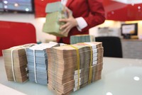 Lãi suất cho vay phát sinh mới bình quân của ngành ngân hàng hiện giảm còn 8,6%/năm. Ảnh: Dũng Minh