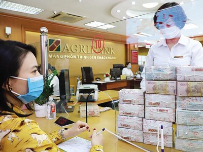 Hôm qua, NHNN thông báo nới room tín dụng toàn hệ thống năm nay thêm 1,5 - 2%.