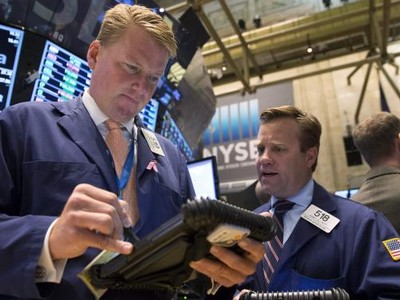 Phố Wall có tuần tăng mạnh nhờ thông tin từ FED - Ảnh: Reuters
