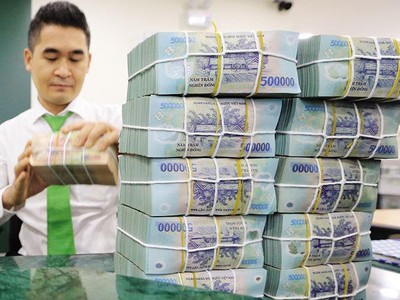 Nhiều khả năng NHNN vẫn chưa “xài” hết room tín dụng của cả năm là 14%. Ảnh: Đức Thanh