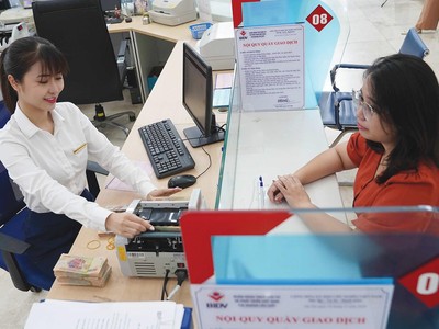 Room tín dụng 2022 hiện đã tiệm cận kế hoạch 14%. Ảnh: Dũng Minh