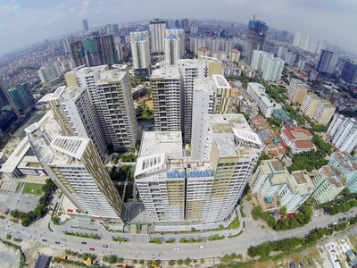 Nhà chung cư đang hút tiền. Ảnh: Dũng Minh