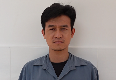 Đối tượng Nguyễn Thành Nguyễn tại cơ quan điều tra. (Ảnh: TTXVN phát)