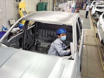 Hoạt động tại Công ty Sparton Việt Nam trong Khu công nghiệp VSIP Bình Dương. Ảnh: Lê Toàn
