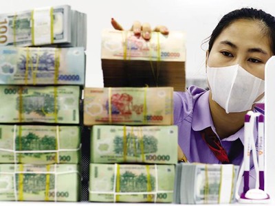 Fed nâng lãi suất có thể đẩy tỷ giá ở Việt Nam tăng theo dù áp lực với tỷ giá năm tới không lớn do kinh tế Việt Nam đang phục hồi, lạm phát thấp, cung - cầu ngoại tệ ổn định, cán cân thanh toán tiếp tục thặng dư. Ảnh: Đức Thanh