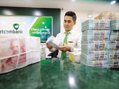 Chính sách tỷ giá luôn ảnh hưởng trực tiếp đến sự biến động của thị trường tài chính. Ảnh: Đ.T