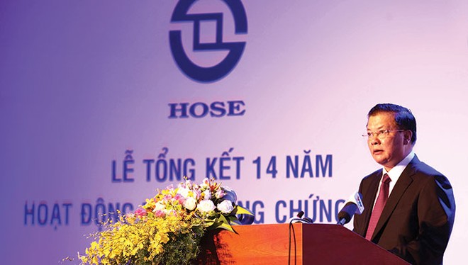 Bộ trưởng Đinh Tiến Dũng phát biểu tại Lễ tổng kết 14 năm TTCK Việt Nam, tháng 7/2014