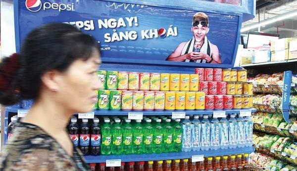 Thị trường đồ uống có gas gần như là sự độc chiếm của Coca-Cola và Suntory PepsiCo. Ảnh: Hà Thanh