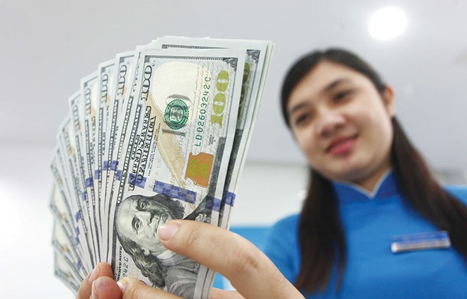Những tác động từ bên ngoài vào thị trường tiền tệ Việt Nam từ nay đến cuối năm không lớn.
Ảnh: Lê Toàn