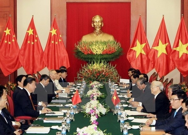 Chủ tịch nước Trương Tấn Sang hội đàm với Tổng Bí thư, Chủ tịch nước Trung Quốc Tập Cận Bình. (Ảnh: Vietnam+)