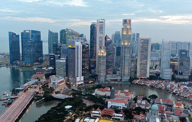 Giá nhà trượt dài, doanh nghiệp địa ốc Singapore ôm “núi nợ”