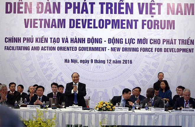 Thủ tướng Chính phủ Nguyễn Xuân Phúc dự Diễn đàn Phát triển Việt Nam 2016 (VDF 2016) - Ảnh: Đức Thanh