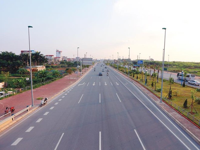 Đại lộ Võ Nguyên Giáp đã giảm nửa quãng đường ra Sân bay Nội Bài, giúp tăng sức thu hút đầu tư cho Hà Nội.