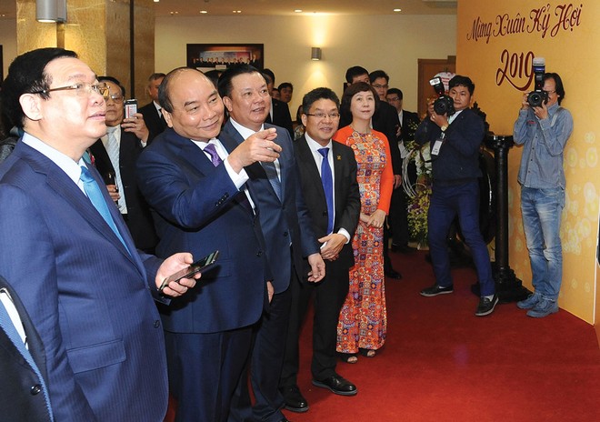 Thủ tướng Nguyễn Xuân Phúc đến dự lễ đánh cồng khai trương phiên giao dịch đầu năm 
Kỷ Hợi vào ngày 12/2.