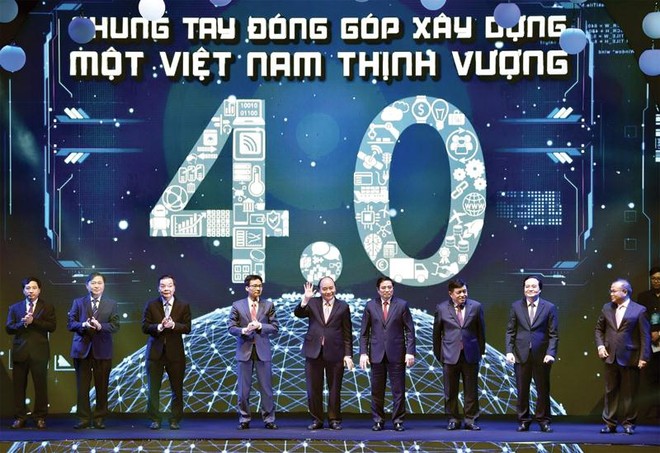 Thủ tướng Nguyễn Xuân Phúc cùng các đại biểu thực hiện nghi thức công bố sáng kiến Mạng lưới đổi mới sáng tạo Việt Nam. Ảnh: VGP