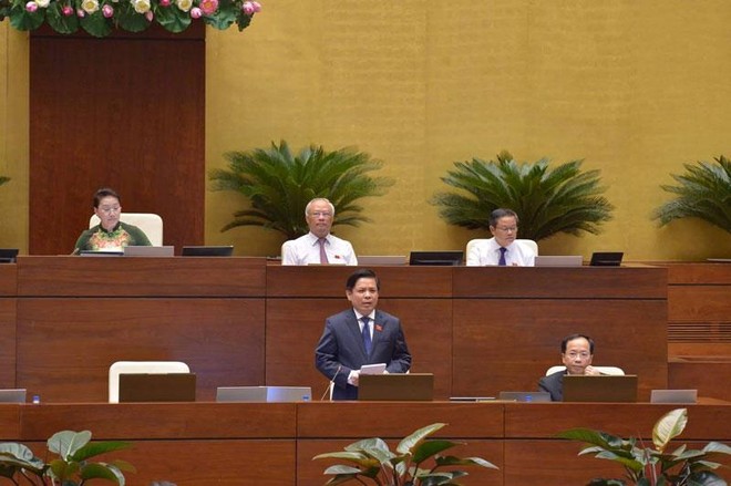 Bộ trưởng Bộ Giao thông - Vận tải Nguyễn Văn Thể trả lời chất vấn các đại biểu Quốc hội ngày 5/6.