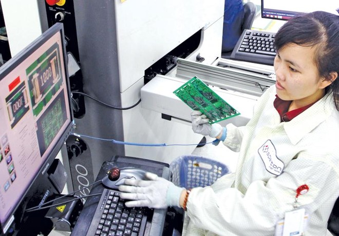Sản xuất thiết bị điện tử tại Nhà máy Sparton Vietnam. Ảnh: Lê Toàn