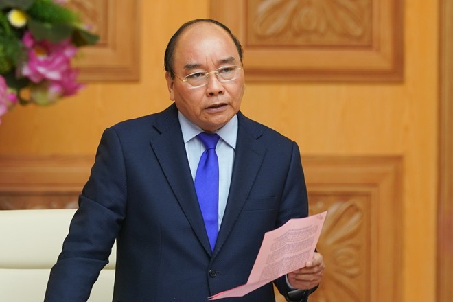Thủ tướng Nguyễn Xuân Phúc: Chính phủ khuyến nghị mọi người dân đeo khẩu trang khi đến chỗ đông người. Ảnh: VGP