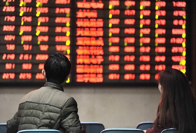 Chứng khoán Trung Quốc đại lục sáng nay 8/4 quay đầu giảm điểm với chỉ số Shanghai Composite mất 0,52%. Ảnh: AFP