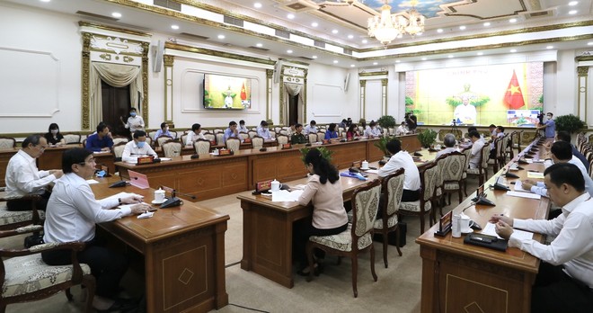 Bộ trưởng Nguyễn Chí Dũng đề nghị lãnh đạo TP.HCM chú ý đến nguy cơ doanh nghiệp Việt bị thâu tóm tại buổi làm việc của Thủ tướng Chính phủ với lãnh đạo TP.HCM về tình hình kinh tế xã hội 4 tháng đầu năm 2020 (Ảnh: Trung tâm báo chí).