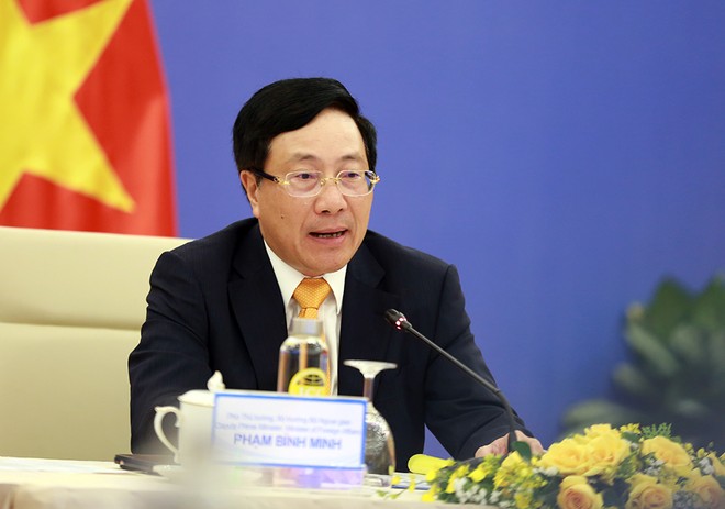 Phó Thủ tướng Phạm Bình Minh đồng chủ trì phiên họp (Ảnh: VGP)