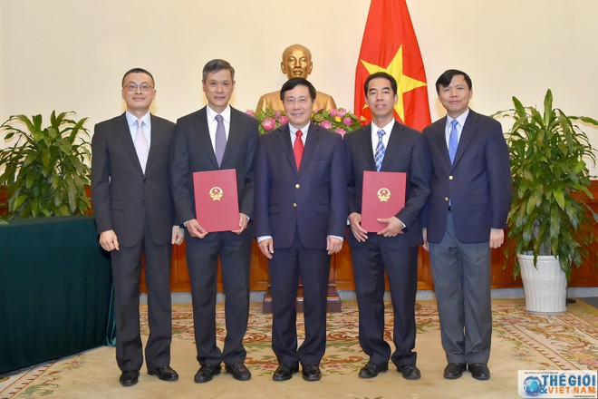 Phó Thủ tướng, Bộ trưởng Ngoại giao Phạm Bình Minh và các nhân sự vừa được bổ nhiệm. Ảnh báo Quốc tế