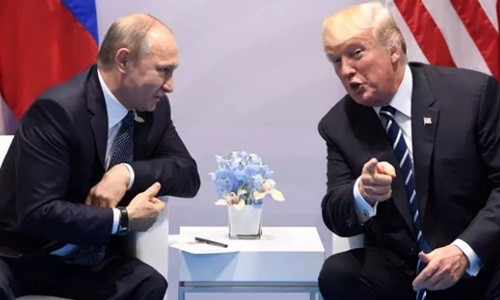 Tổng thống Nga và Tổng thống Mỹ trong cuộc gặp tại G20. Ảnh: AFP