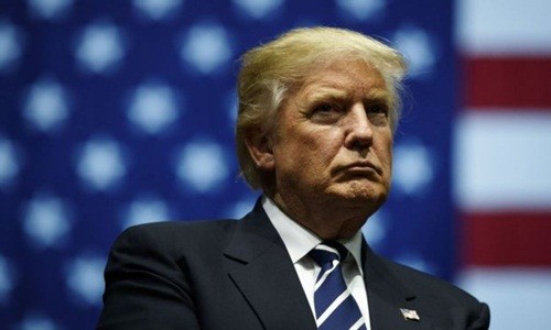 Tổng thống Donald Trump lo ngại an ninh quốc gia vì thương vụ liên quan đến Trung Quốc. Ảnh: AFP