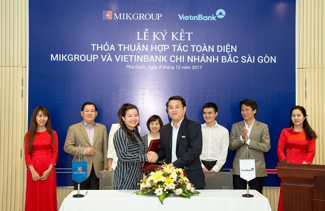 Bà Hoàng Thị Thu Hằng, Phó tổng giám đốc MIKGroup và ông Vũ Quôc Việt, Giám đốc Vietibank Chi nhánh Bắc Sài Gòn ký kết bản thỏa thuận hợp tác toàn diện